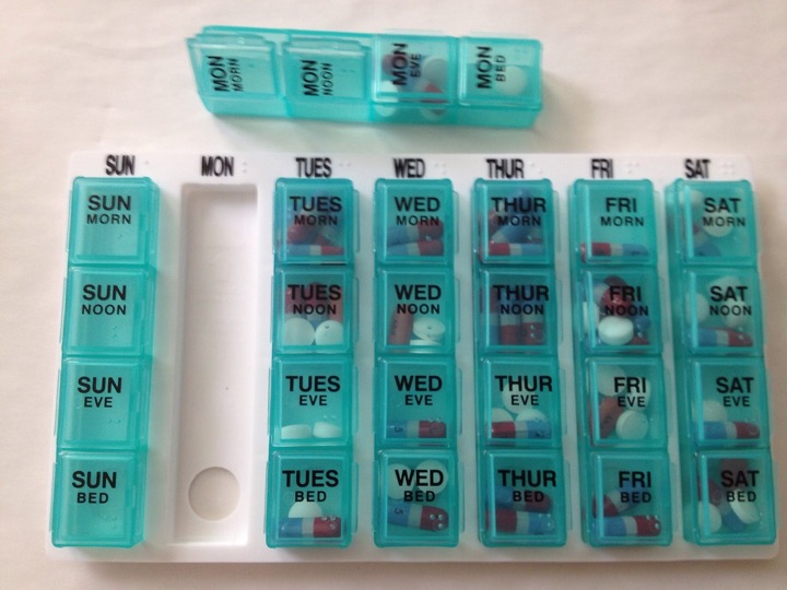 Teal modular pill organiser with four doses per day